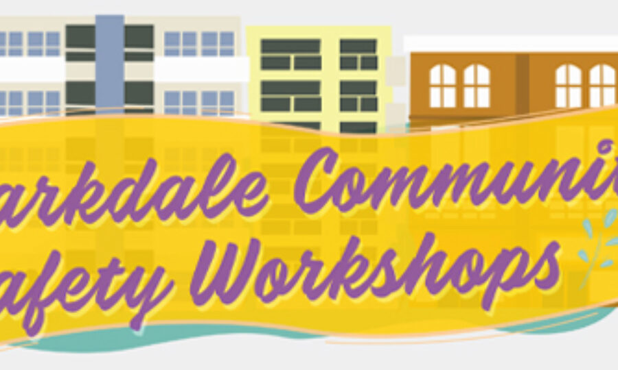 Illustration of a banner with text "Parkdale Community Safety Workshops" against a backdrop of illustrated buildings. The text is in a purple script on a yellow ribbon-like banner.